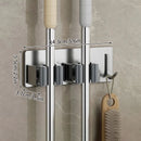 Título: Suporte de Aço Inoxidável para Vassouras e Mop – Organize Seu Espaço com Estilo